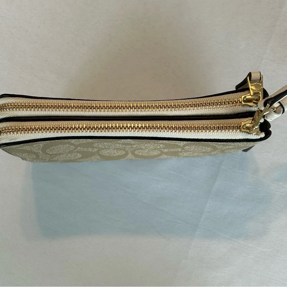 Coach Signature Double Zipper Wristlet in Tan and White with gold trim. - Picture 5 of 5